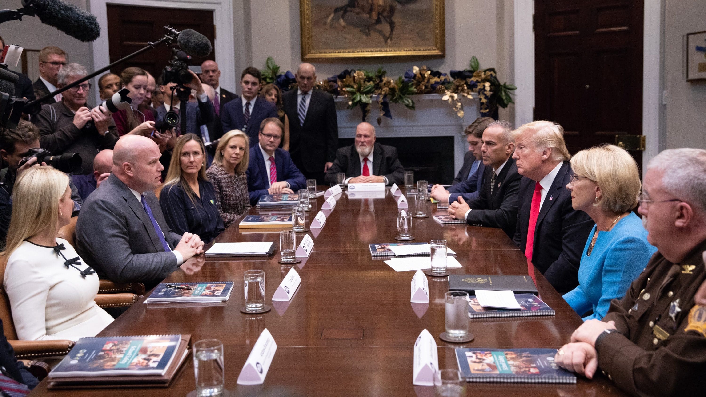 President Trump meet with members of his cabinet and families of victims of school violence.